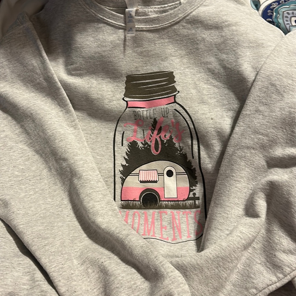 Grey sweater size medium but could probably fit large